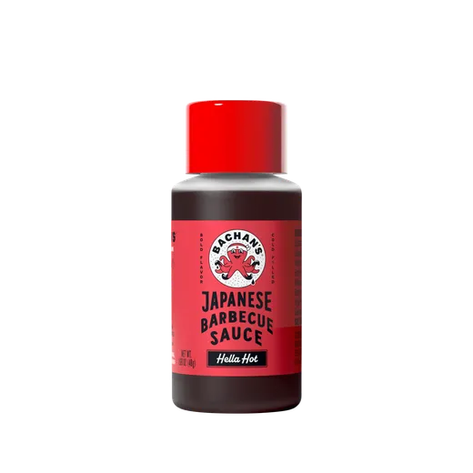 A small bottle of Bachan's Hella Hot Japanese Barbecue Sauce against a black background.