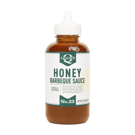 A full bottle of honey BBQ sauce on a black background.