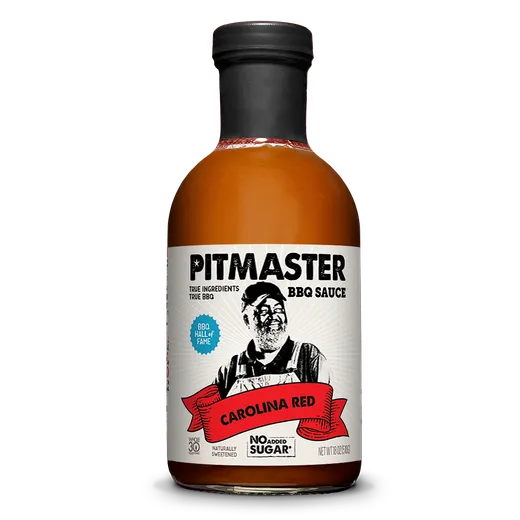A bottle of Pitmaster Carolina Red BBQ sauce against a white background.