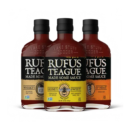 Three bottles of Rufus Teague BBQ sauce displayed together against a white background.