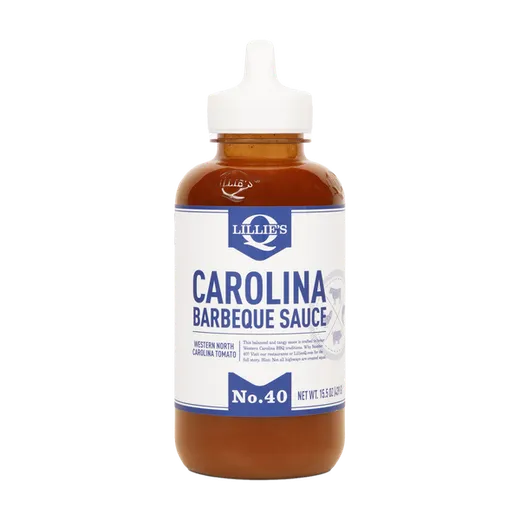 A full bottle of Lillie's Q Carolina Barbeque Sauce centered on a black background.