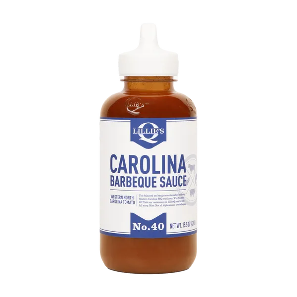 A full bottle of Lillie's Q Carolina Barbeque Sauce centered on a black background.