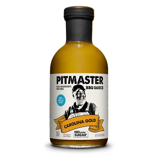 A close-up of a single bottle of Pitmaster Carolina Gold BBQ sauce against a white background.