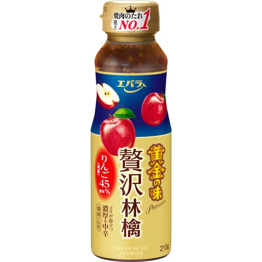 A close-up studio shot of a bottle of Ebara Ohgon No Aji premium apple BBQ sauce against a white background.