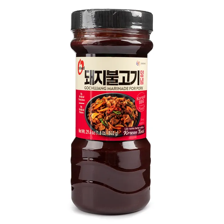 A front view of the Gochujang marinade bottle featuring a serving suggestion image.