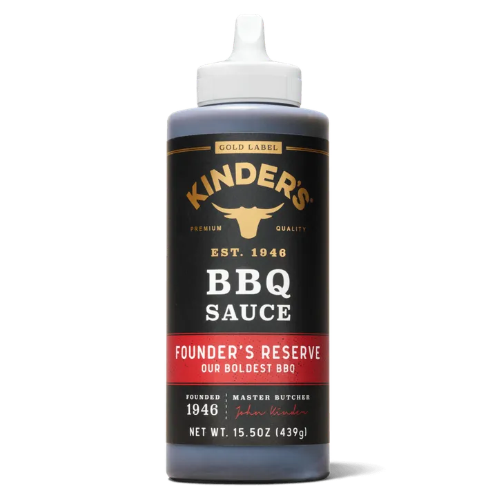 A bottle of Kinder's Founder's Reserve BBQ sauce stands on a plain background.