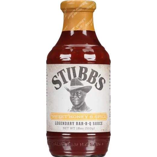A front view of a Stubb's Sweet Honey & Spice BBQ sauce bottle.